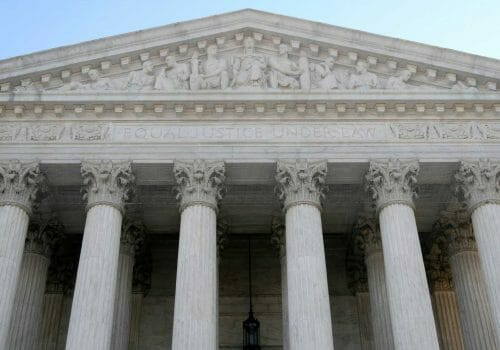 front view of the US Supreme Court emphasizing columns