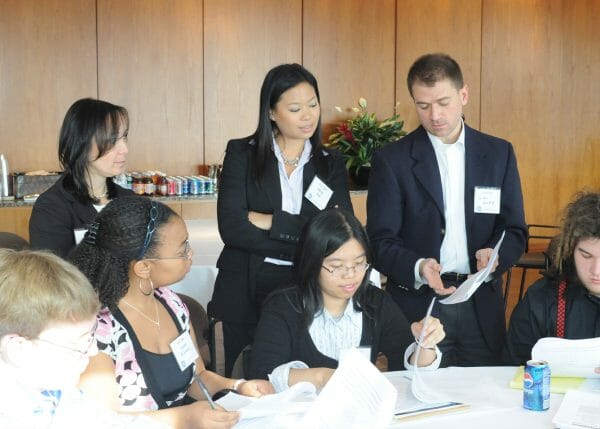 lawyers helping young students at a Pipeline event