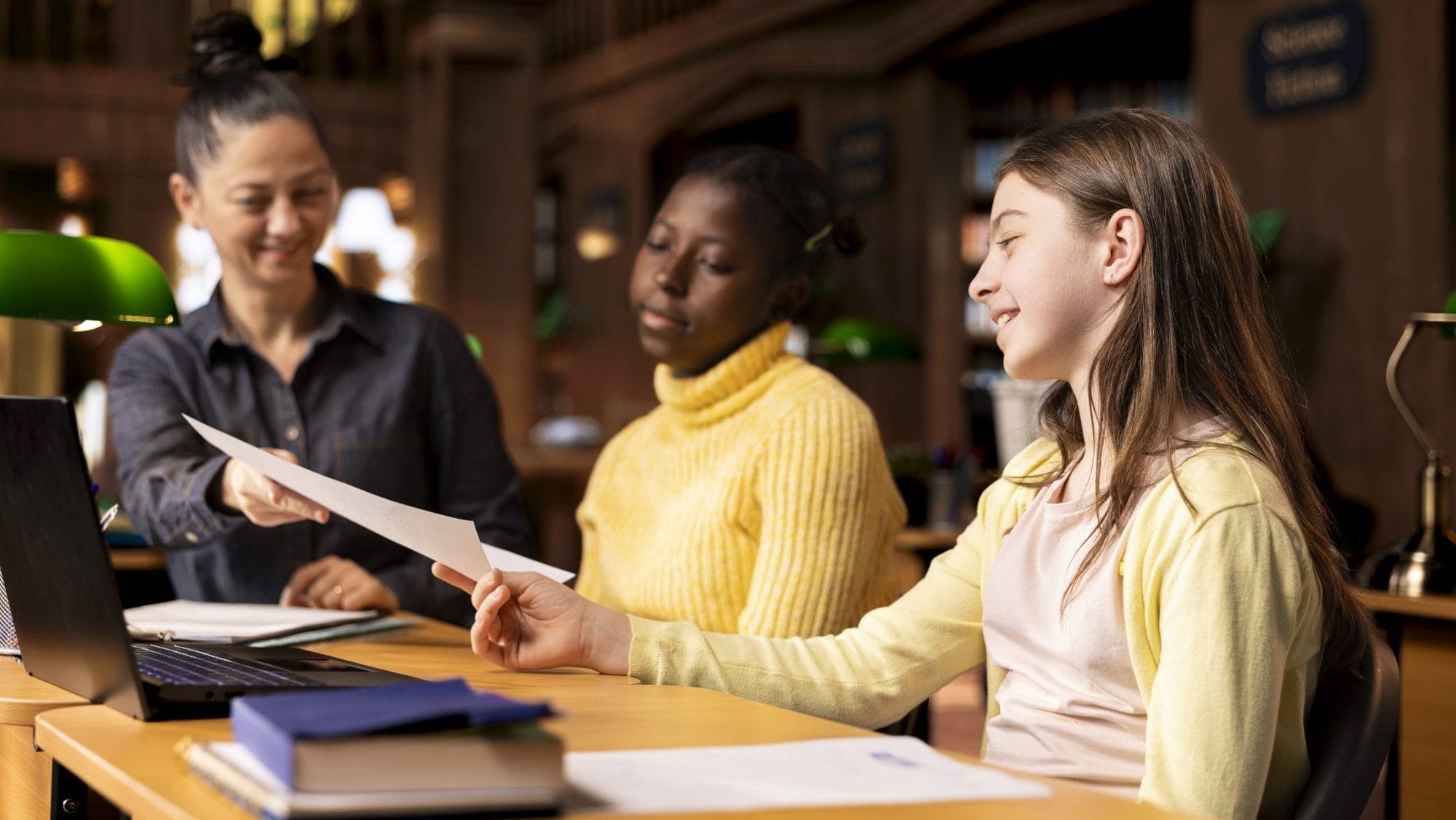 tutor-providing-learning-materials-academic-session-with-schoolgirls tutor-providing-learning-materials-academic-session-with-schoolgirls