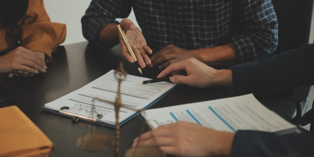 justice-law-concept-legal-counsel-presents-client-signed-contract-with-gavel-legal-law-legal-having-team-meeting-law-firm-background justice-law-concept-legal-counsel-presents-client-signed-contract-with-gavel-legal-law-legal-having-team-meeting-law-firm-background